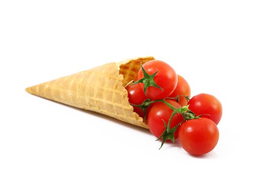fresh tomatoes like an ice cream on white background