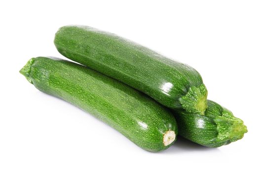 a fresh zucchini on white background