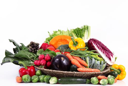 a fresh group of vegetables on white background