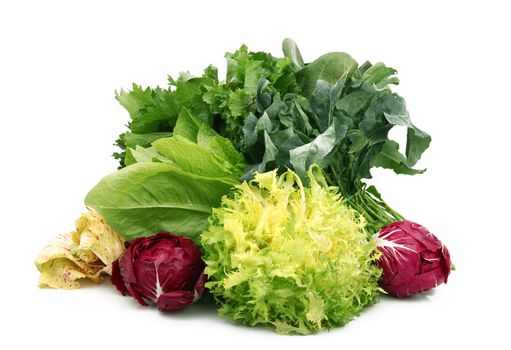 a fresh group of vegetables on white background