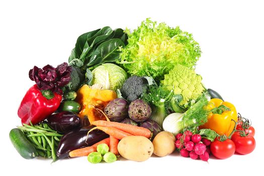 a fresh group of vegetables on white background