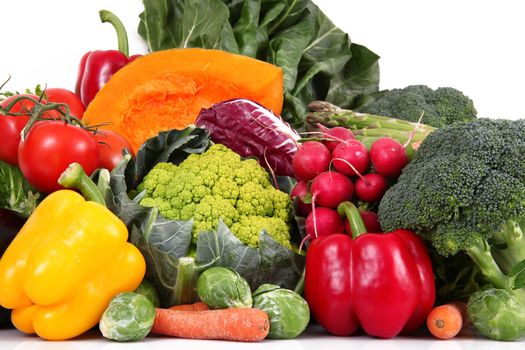 a fresh group of vegetables on white background