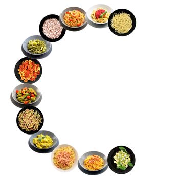 C alphabet italian pasta on white background