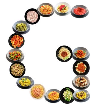 G alphabet italian pasta on white background
