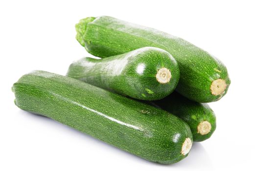 a fresh zucchini on white background