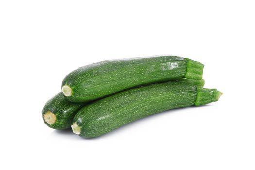 a fresh zucchini on white background