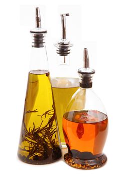 bottles of oil on white background