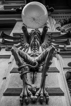 Turin, Italy. Mysterious Giant Gargoyle Lamp in public street, dated around 1850