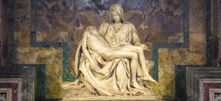 ROME, VATICAN STATE - August 28, 2018: Pietà di Michelangelo (The Pity), 1498-1499, located in St. Peter Basilica in Rome