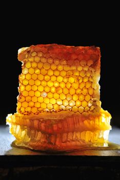 Sweet Honeycomb on black background