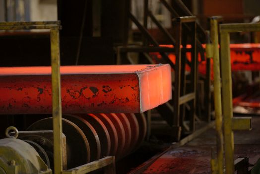 Hot steel on conveyor in steel plant