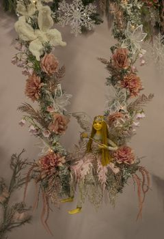 Amsterdam,Holland,18-oct-2018:beautifull christmas decoration with pink Christmas garland with fairy and floral ornament as a wreath