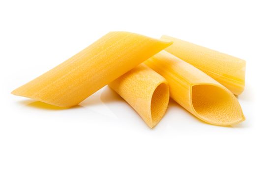 italian raw pasta on white background