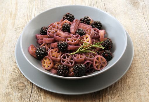 delicious italian pasta with blackberries