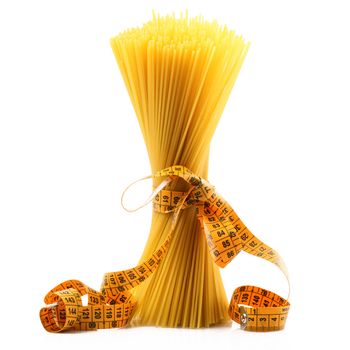 italian raw pasta on white background with metre