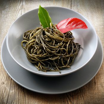 italian spaghetti with squid ink sauce