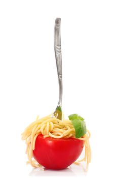 tomato stuffed with italian pasta and fork