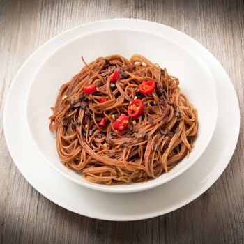 original italian spaghetti with chocolate and pepper