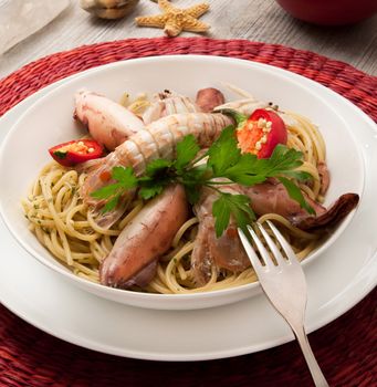 italian spaghetti with squid and mantis shrimp