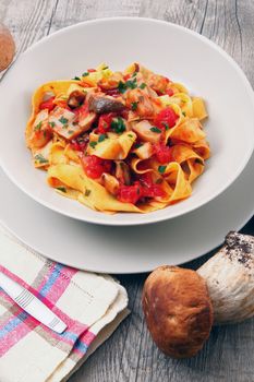 original italian tagliatelle with mushroom and tomato