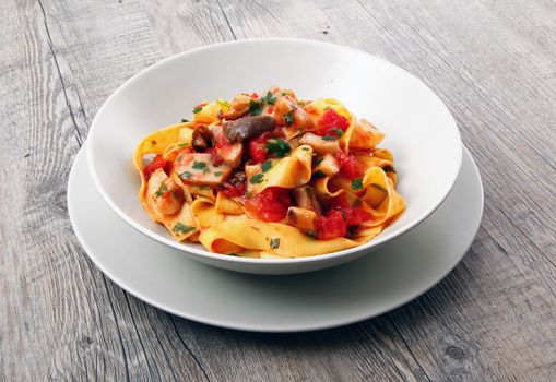 original italian tagliatelle with mushroom and tomato