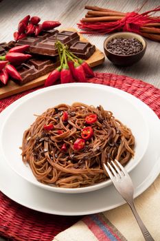 original italian spaghetti with chocolate and pepper