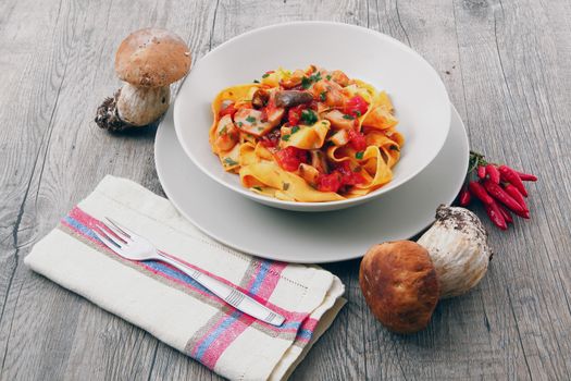 original italian tagliatelle with mushroom and tomato