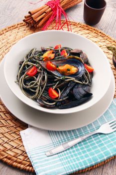 italian spaghetti with squid ink and mussels