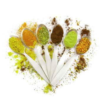 A spoonful of spoons with spices and ingredients