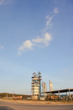 Modern industrial exterior building over blue sky
