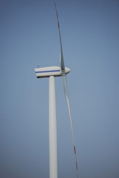 wind trubine at sunny day with blue sky