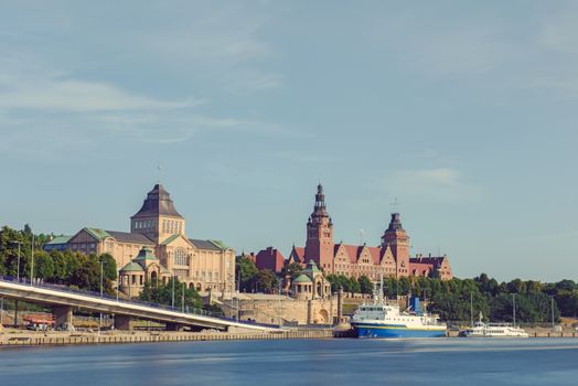 Cityscape with Odra river. Szczecin historical city with architectural layout similar to Paris. Castle of Pomeranian dukes in Szczecin and Basilica of Saint James