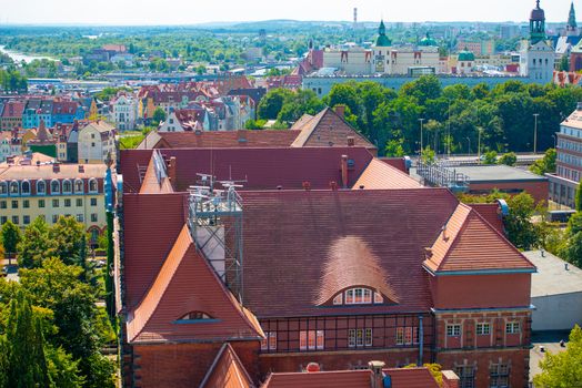 Cityscape with Odra river. Szczecin historical city with architectural layout similar to Paris. Castle of Pomeranian dukes in Szczecin and Basilica of Saint James