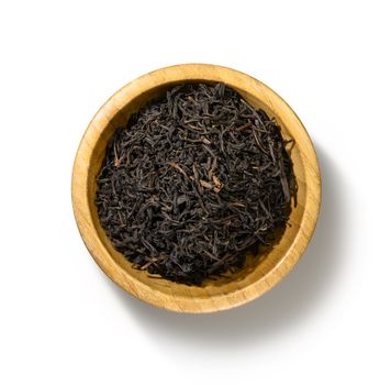 Black tea top view on white background.