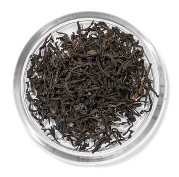 Black tea top view on white background.