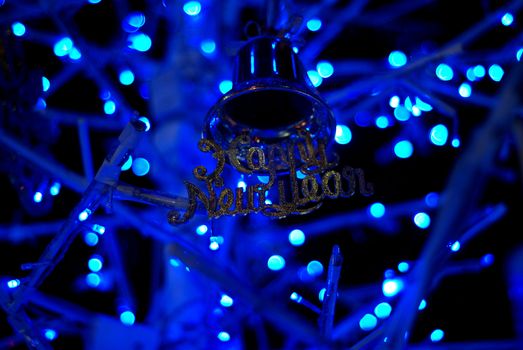 A bell with christmas lighting background, bokeh, Light bokeh abstract.