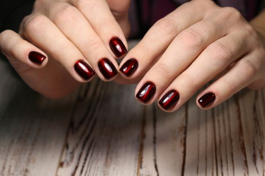 Cute manicure on female hands. Woman hands