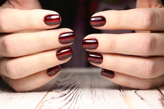 Women's hands with a stylish manicure.