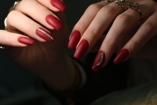 Amazing natural nails. Women's hands with clean manicure. Gel polish applied.