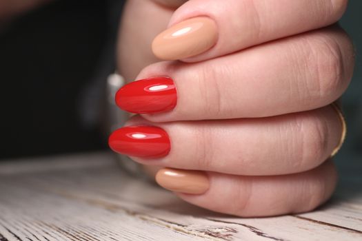 glamorous beautiful manicure on a trendy texture