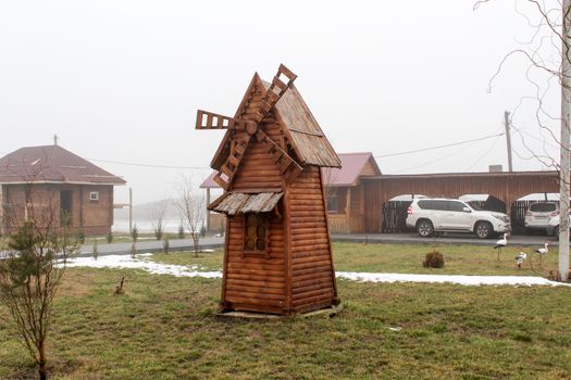 Beautiful wooden mill on a farm. Ukraine