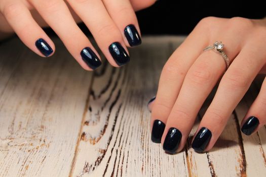 Women's hands with a stylish manicure.