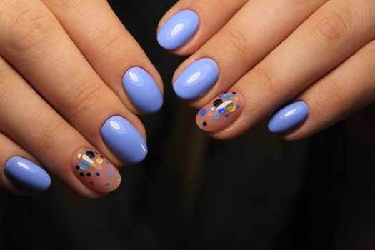 Women's hands with a stylish manicure.