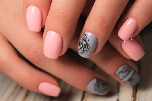 Women's hands with a stylish manicure.