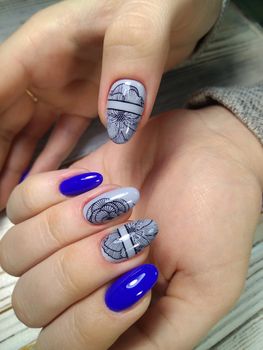 Women's hands with a stylish manicure.