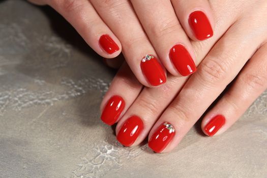 Hands with beautiful manicure. Natural nails with gel polish
