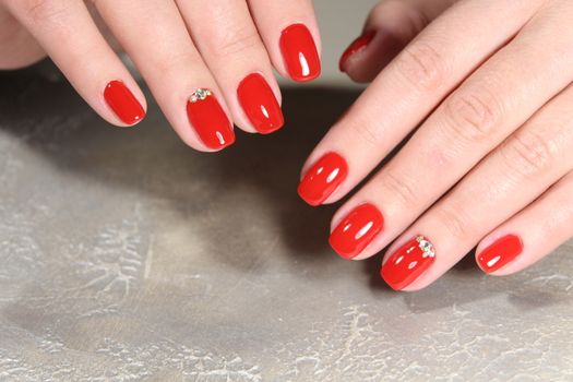 Hands with beautiful manicure. Natural nails with gel polish