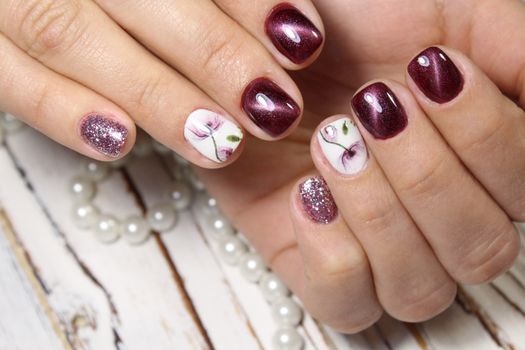 Cute manicure on female hands. Woman hands