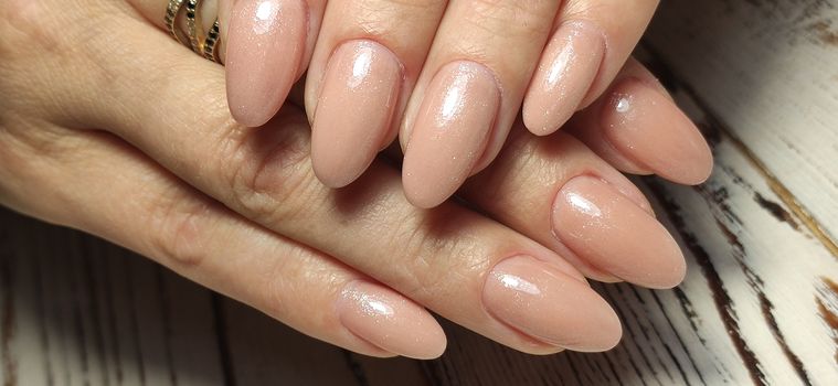Hands Care. Hand With Pastel Nails In Sea Salt.