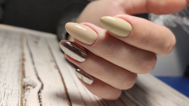 Youth manicure design, beautiful female hands